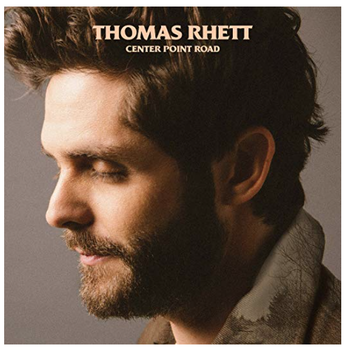 Album cover for Thomas Rhett's Center Point Road showing a sideview of his face