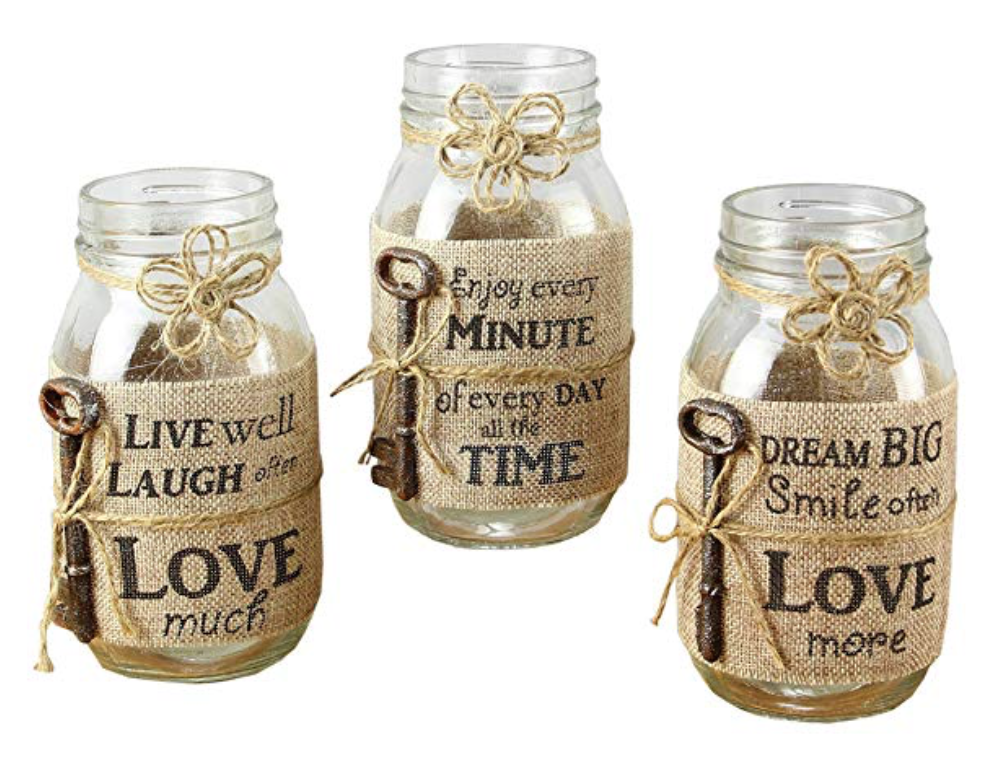 A set of three mason jar candles wrapped in burlap with quotes printed